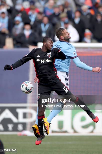 March 12: Patrick Nyarko of D.C. United and Maxime Chanot of New York City FC challenge for the ball during the NYCFC Vs D.C. United regular season...