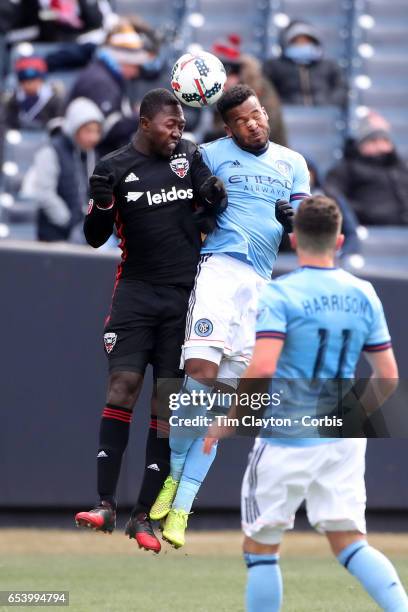 March 12: Patrick Nyarko of D.C. United and Ethan White of New York City FC challenge for the ball during the NYCFC Vs D.C. United regular season MLS...
