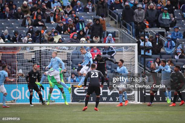 March 12: A general view as Maxime Chanot of New York City FC heads clear while challenged by Patrick Nyarko of D.C. United during the NYCFC Vs D.C....