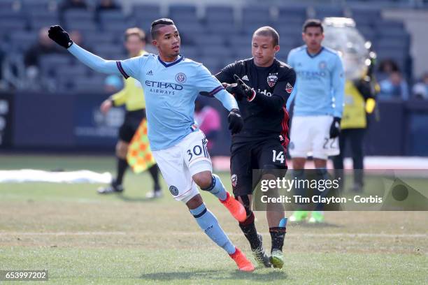 March 12: Yangel Herrera of New York City FC is challenged by Nick DeLeon of D.C. United during the NYCFC Vs D.C. United regular season MLS game at...