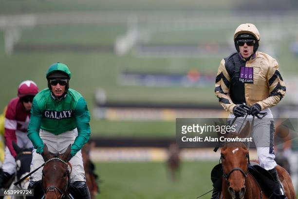 Ruby Walsh celebrates after riding Yorkhill to win The JLT Novices' Steeple Chase during St Patrick's Thursday on day three of the festival meeting...