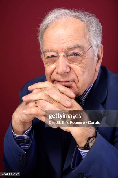 Journalist Michel Chevalet poses during a portrait session in Paris, France on .