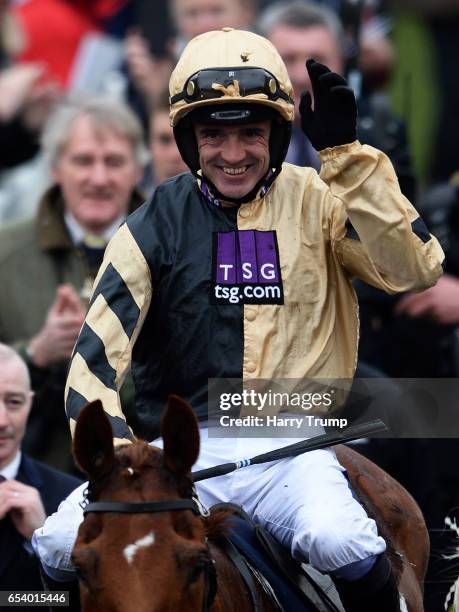 Ruby Walsh celebrates on board Yorkhill after victory in the JLT Novices Steeple Chase during St Patrick's Thursday of the Cheltenham Festival at...