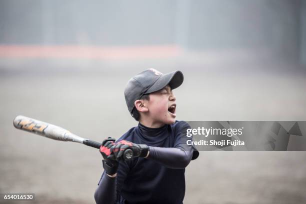 youth baseball players, hitting big - batting sports activity ストックフォトと画像