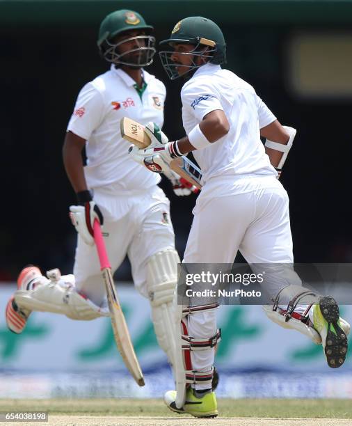 Bangladesh' Soumya Sarkar and Tamim Iqbal run between the wickets during the second day of the second and final Test cricket match between Sri Lanka...