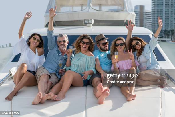 happy friends sailing on a yacht - miami party stock pictures, royalty-free photos & images