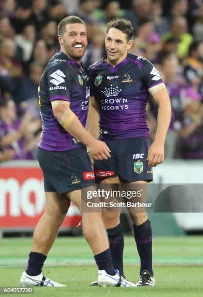 Billy Slater of the Melbourne Storm is congratulated by Kenneath Bromwich of the Melbourne Storm after winning the round three NRL match between the...