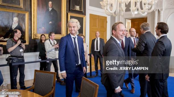 Dutch PVV leader Geert Wilders arrives for a meeting with the Chairman of the Senate in The Hague, on March 16 one day after the general elections. /...