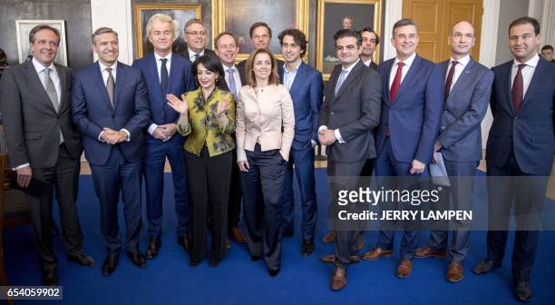 Dutch Prime Minister Mark Rutte and Dutch PVV leader Geert Wilders pose with other party leaders prior to a meeting with the Chairman of the Senate...