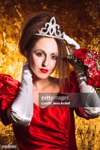 1980s prom queen wearing red dress - 80s prom dress stock pictures, royalty-free photos & images