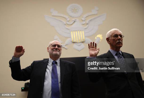 Ninth Circuit Appeals Court Judges Sidney Thomas and Carlos Bea are sworn in before the start of a House Judiciary Committee hearing on March 16,...