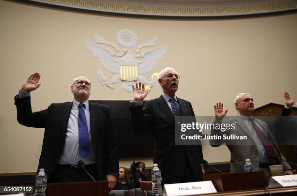 Ninth Circuit Appeals Court Judges Sidney Thomas, Carlos Bea and Alex Kozinski are sworn in before the start of a House Judiciary Committee hearing...