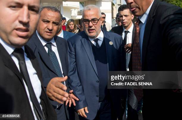 Morocco's Secretary General of the ruling Islamist Justice and Development Party and former prime minister, Abdelilah Benkirane, leaves after holding...