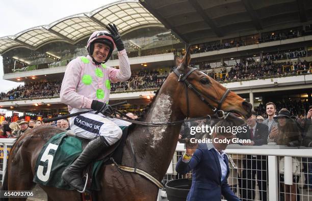 Cheltenham , United Kingdom - 16 March 2017; Ruby Walsh holds up a number four after winning his fourth race of the day in the Trull House Stud...