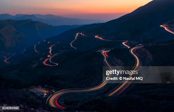light trails on jabel jais mountain road - uae mountain stock pictures, royalty-free photos & images