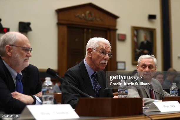 Ninth Circuit Appeals Court Judge Carlos Bea speaks as fellow Judges Sidney Thomas and Alex Kozinski look on during a House Judiciary Committee...