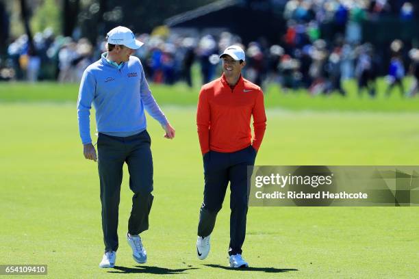 Brandt Snedeker of the United States and Rory McIlroy of Northern Ireland walk on the first hole during the first round of the Arnold Palmer...