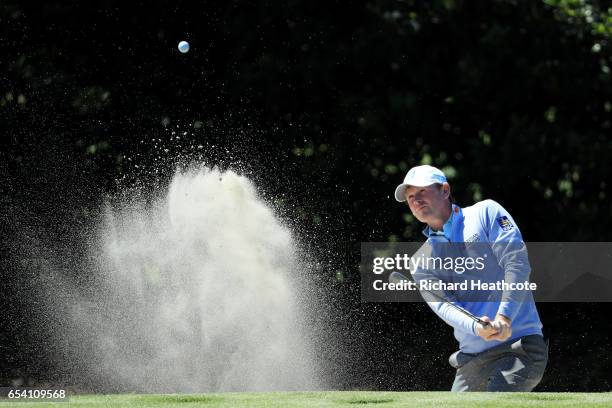 Brandt Snedeker of the United States plays a shot from a bunker on the first hole during the first round of the Arnold Palmer Invitational Presented...