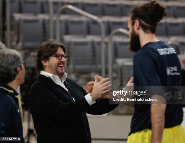 Andrea Trinchieri, Head Coach of Brose Bamberg welcomes Luigi Datome, #70 of Fenerbahce Istanbul before the 2016/2017 Turkish Airlines EuroLeague...