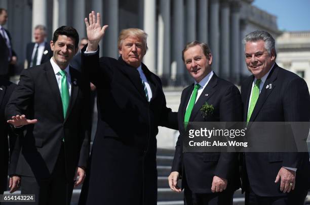 President Donald Trump , House Speaker Paul Ryan , Irish Taoisech Enda Kenny and Rep. Peter King pose for photographers outside the Capitol after the...