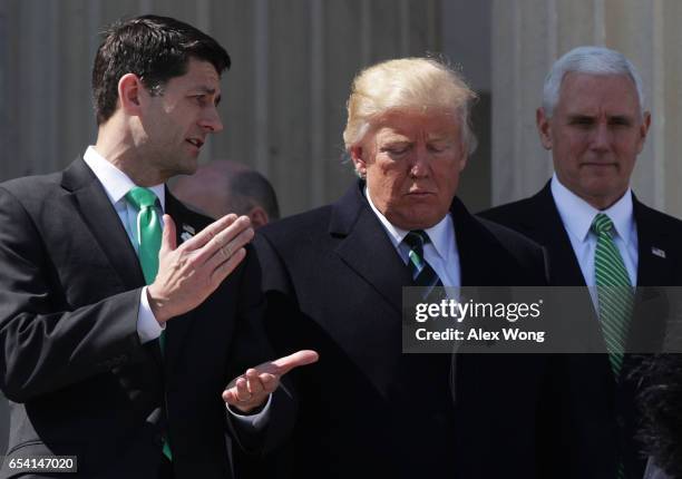 President Donald Trump , House Speaker Paul Ryan and Vice President Mike Pence walk down the House east front steps after the annual Friends of...