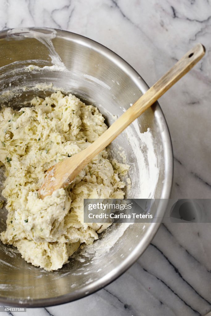 Mixing Bread Dough In A Metal Bowl With A Wooden Spoon High-Res Stock Photo  - Getty Images