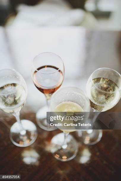 champage, bellini and rose wine in flutes - bellini stock pictures, royalty-free photos & images