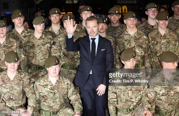Ronan Keating poses with members of the Armed Forces at the World Premiere of "Another Mother's Son" on March 16, 2017 at Odeon Leicester Sqaure in...