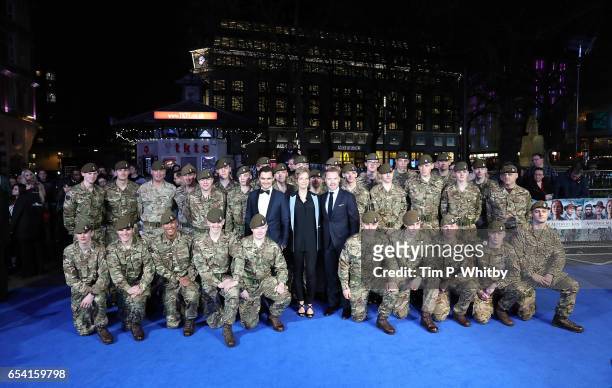 Julian Kostov, Jenny Seagrove and Ronan Keating pose with members of the Armed Forces at the World Premiere of "Another Mother's Son" on March 16,...