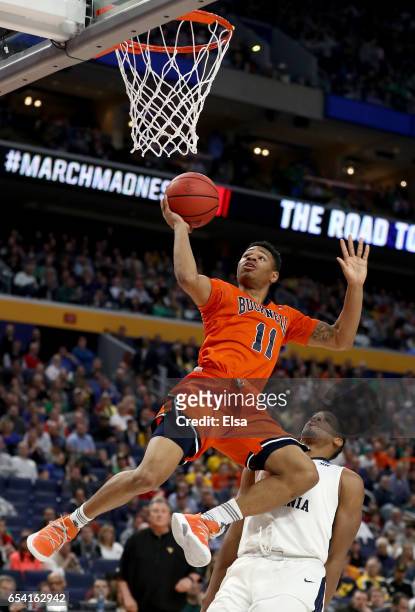 Avi Toomer of the Bucknell Bison shoots the ball against the West Virginia Mountaineers in the first half during the first round of the 2017 NCAA...