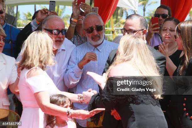 Ednita Nazario is congratulated by her brother Tito Nazario as part of Paseo de la Fama honors celebrities on March 16, 2017 in San Juan, Puerto Rico.