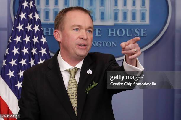 Office of Management and Budget Director Mick Mulvaney takes questions from reporters during a briefing in the Brady Press Briefing Room at the White...