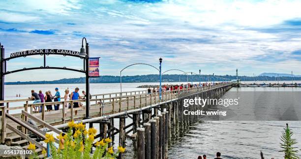 the walking pier in white rock, british columbia - white rock bc stock pictures, royalty-free photos & images