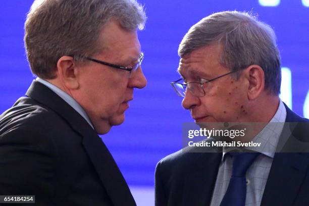 Russian economust Alexey Kudrin talks to billionaire Vladimir Yevtushenkov during the plenary session of the Congress of Russian Union of...