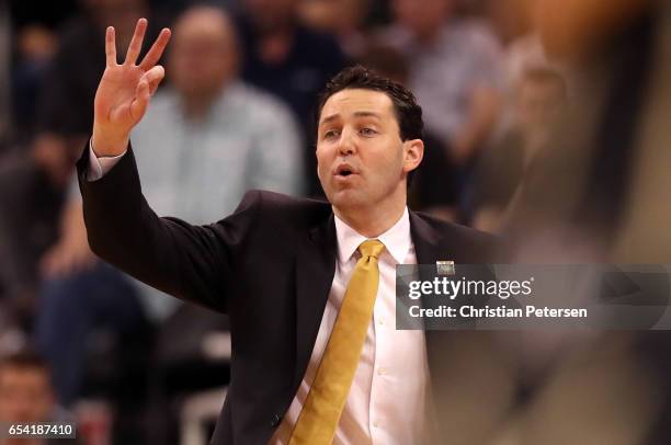 Head coach Bryce Drew of the Vanderbilt Commodores gestures in the first half against the Northwestern Wildcats during the first round of the 2017...