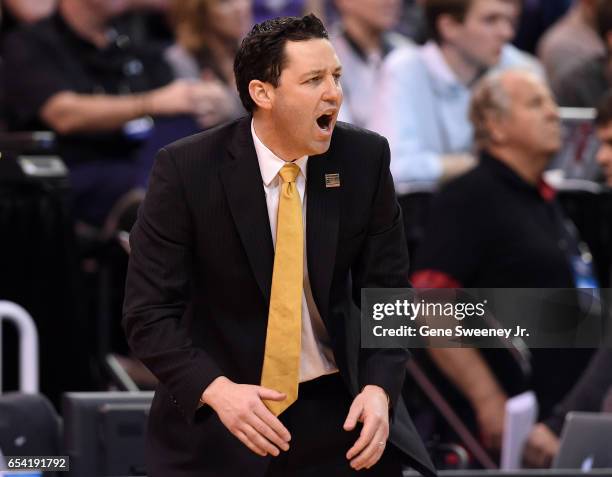 Head coach Bryce Drew of the Vanderbilt Commodores gestures in the first half against the Northwestern Wildcats during the first round of the 2017...