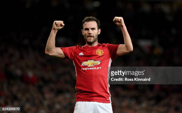 Juan Mata of Manchester celebrates after scoring the opening goal during the UEFA Europa League Round of 16 second leg match between Manchester...