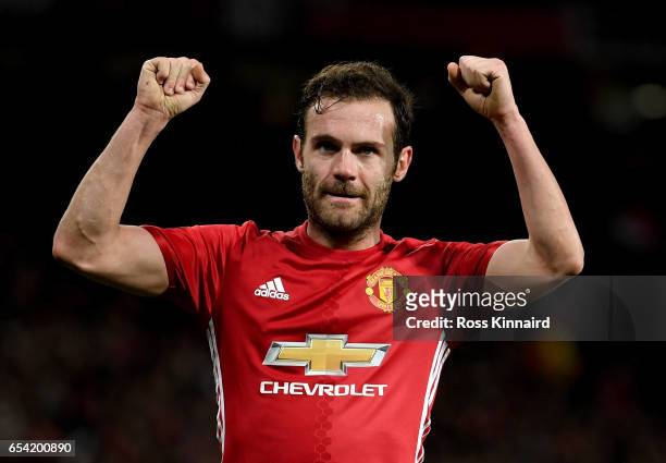 Juan Mata of Manchester celebrates after scoring the opening goal during the UEFA Europa League Round of 16 second leg match between Manchester...