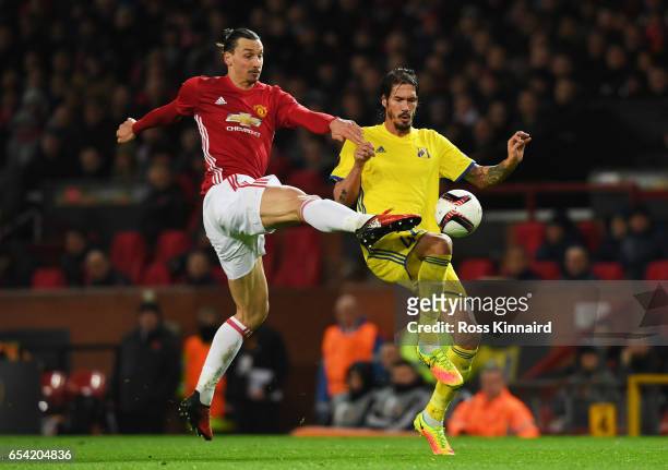 Zlatan Ibrahimovic of Manchester United and Cesar Navas of FC Rostov battle for the ball during the UEFA Europa League Round of 16, second leg match...