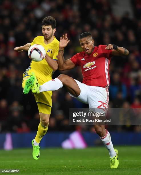 Denis Terentyev of FC Rostov and Antonio Valencia of Manchester United battle for the ball during the UEFA Europa League Round of 16, second leg...