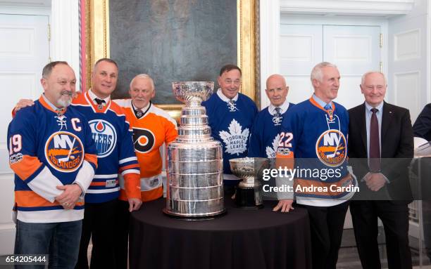 Hockey Hall of Famers Bryan Trottier, Paul Coffey, Bernie Parent, Frank Mahovlich, Dave Keon and Mike Bossy pose with David Johnston, Governor...