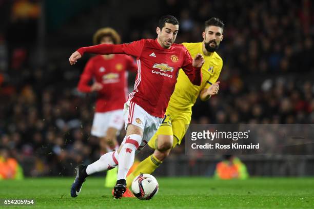 Henrikh Mkhitaryan of Manchester United goes past Miha Mevlja of FC Rostov during the UEFA Europa League Round of 16, second leg match between...