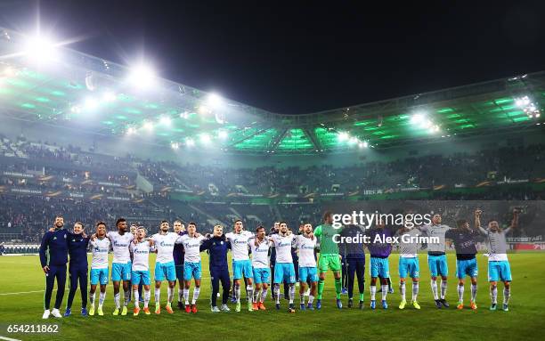 Ralf Faehrmann of Schalke 04 celebrates with team mates after the UEFA Europa League Round of 16 second leg match between Borussia Moenchengladbach...