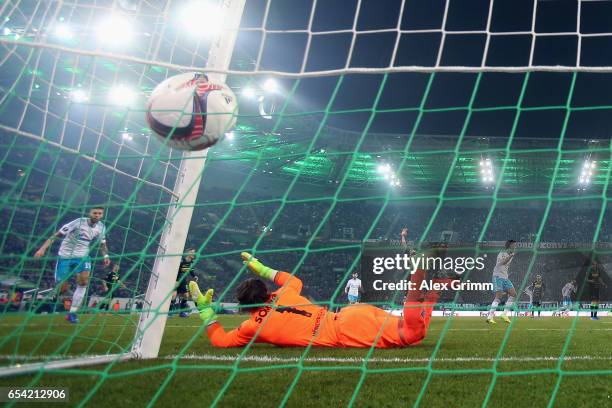 Leon Goretzka of Schalke celebrates his team's first goal past goalkeeper Yann Sommer of Moenchengladbach during the UEFA Europa League Round of 16...