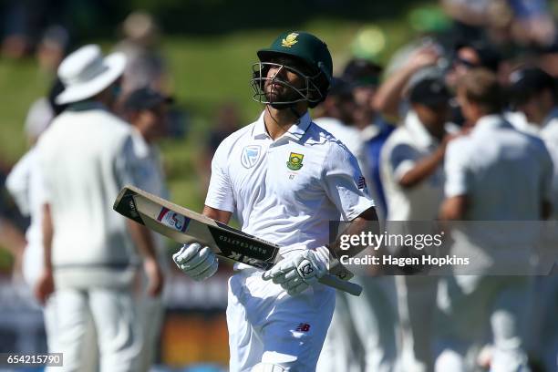 Duminy of South Africa leaves the field after being dismissed during day two of the test match between New Zealand and South Africa at Basin Reserve...