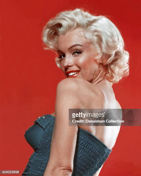 Actress Marilyn Monroe poses for a publicity still for the 20th Century Fox film 'How to Marry a Millionaire' in 1953 in Los Angeles, California.