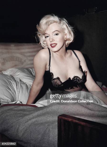 Actress Marilyn Monroe poses for a publicity still for the 20th Century Fox film 'Some Like it Hot' in 1958 in Los Angeles, California.