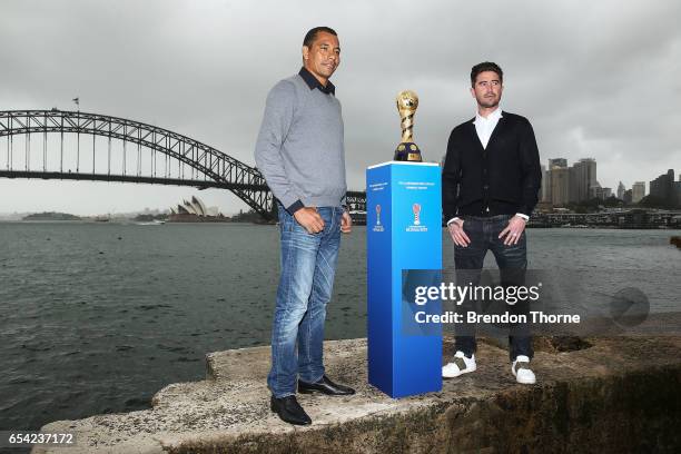 Gilberto Silva and Harry Kewell pose with the 2017 FIFA Confederations Cup at Blues Point Reserve on March 17, 2017 in Sydney, Australia.