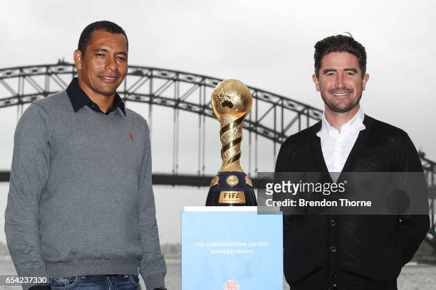Gilberto Silva and Harry Kewell pose with the 2017 FIFA Confederations Cup at Blues Point Reserve on March 17, 2017 in Sydney, Australia.