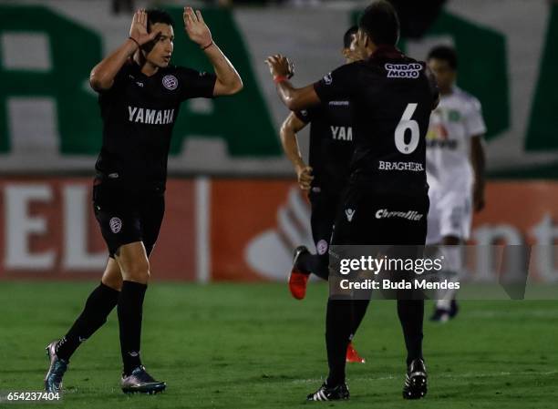 Nicolas Aguirre of Lanus, celebrates with teammate Maximiliano Velazquez during a match between Chapecoense and Lanus as part of Copa Bridgestone...